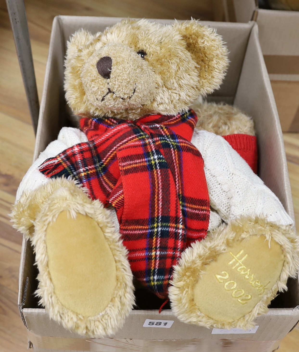 Four Harrods Bears, some dressed